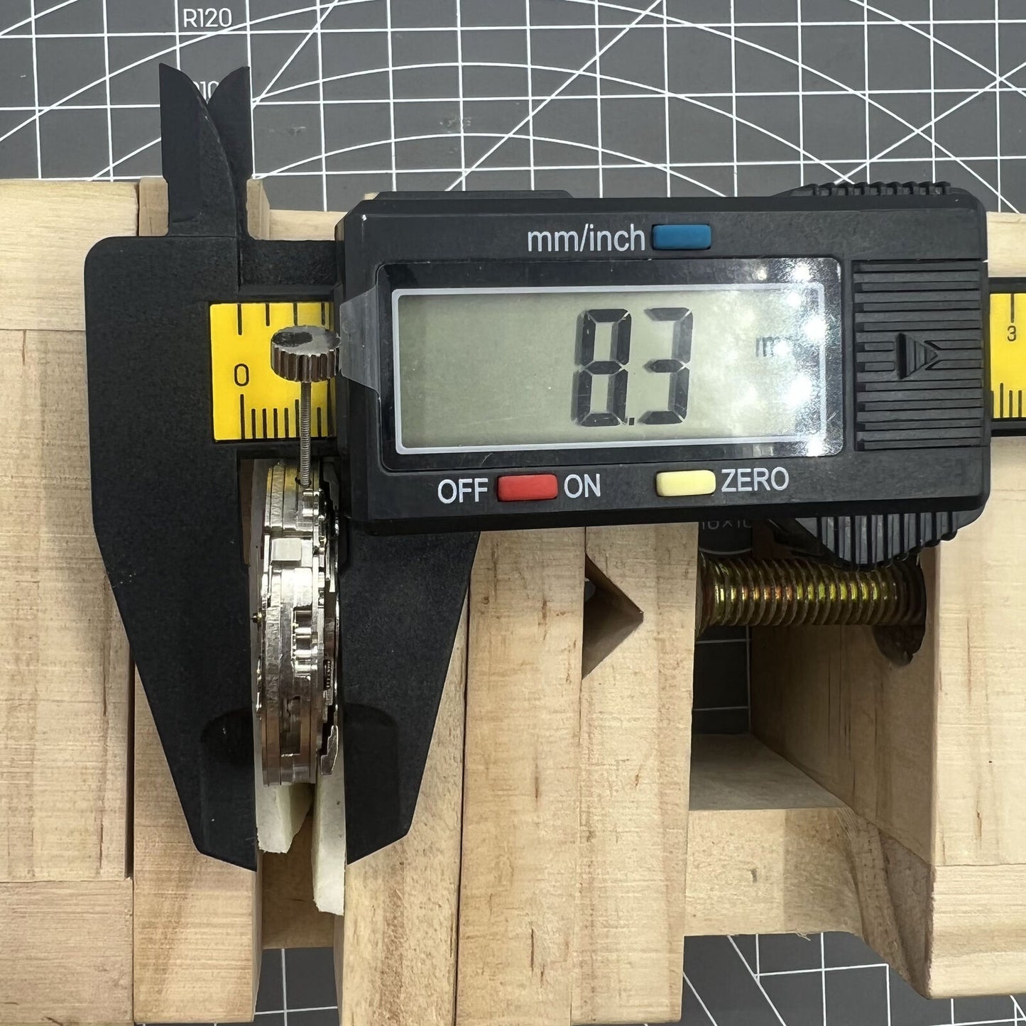 Dandong Silver hollow balance wheel showcasing automatic mechanical watch movement precision.