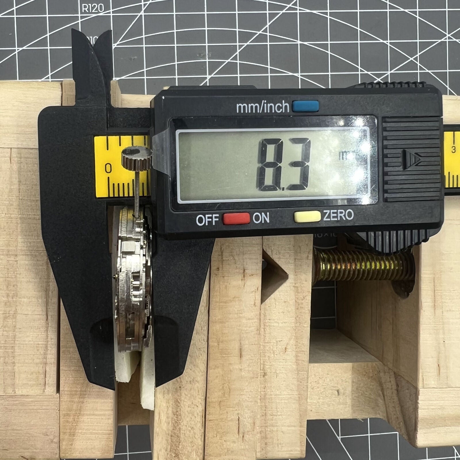 Dandong Silver hollow balance wheel showcasing automatic mechanical watch movement precision.