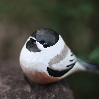 Handcrafted black-capped chickadee wooden figurine, perfect for home decor and gifts.