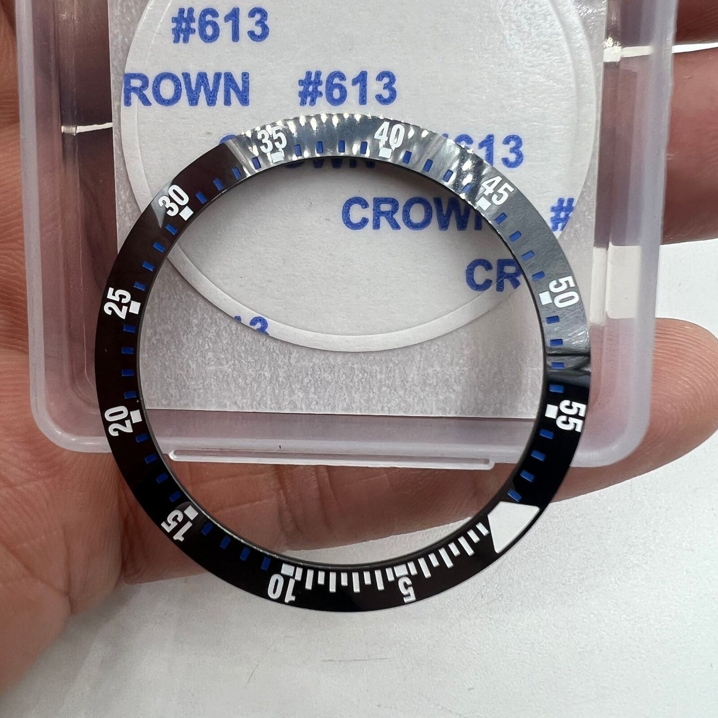 Black ceramic bezel insert with blue markers, 38mm/30.5mm, ideal for watch customization.