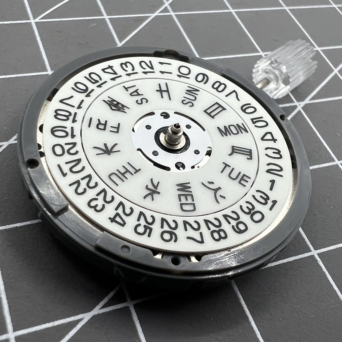 Seiko NH36A white dial watch movement with blue lume and 3/3.8 crown positions for accuracy.