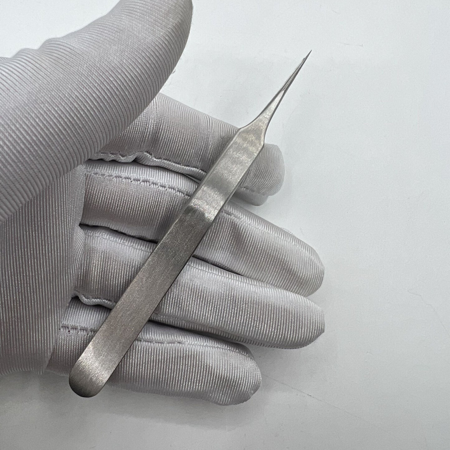 Horotec MSA12.302-4 steel antimagnetic tweezer for precise watch component handling, Swiss Made quality.