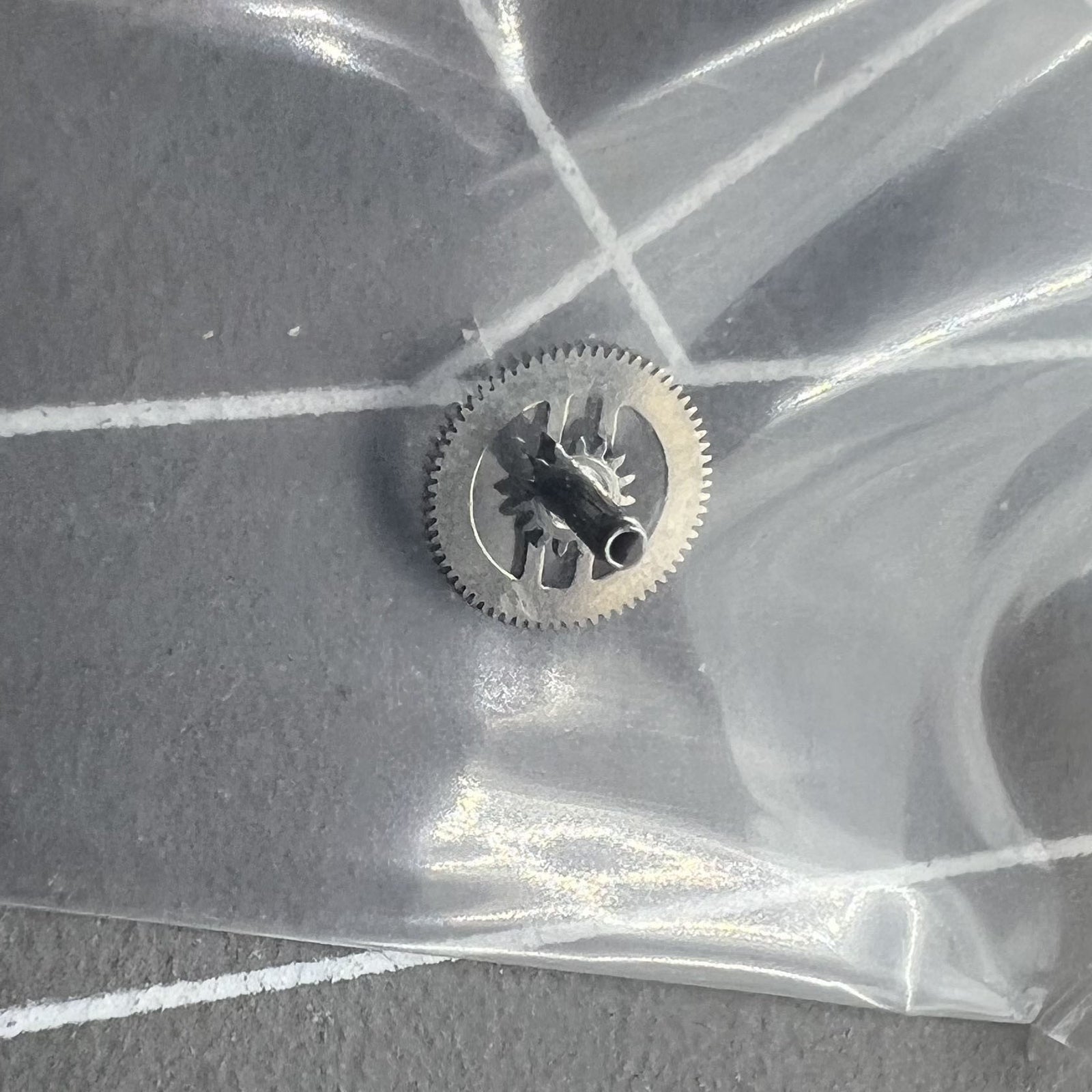Cannon pinion with driving wheel for ETA 2671 2775 watch movement by Precision, durable replacement part.