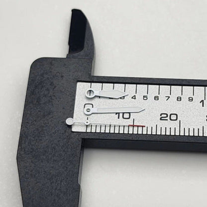 White-trimmed arrow-shaped watch hands with green lume and red tips, compatible with NH35 NH36 movements.