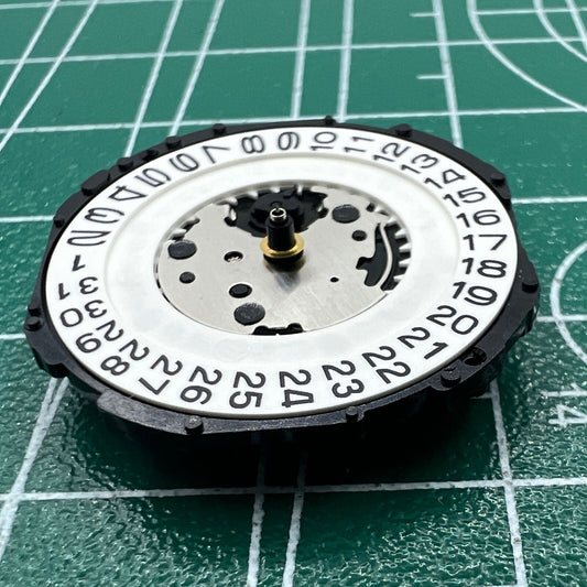 Hattori Epson PC32 quartz watch movement with 3 hands and date at 3, Japan made for watch accessories.