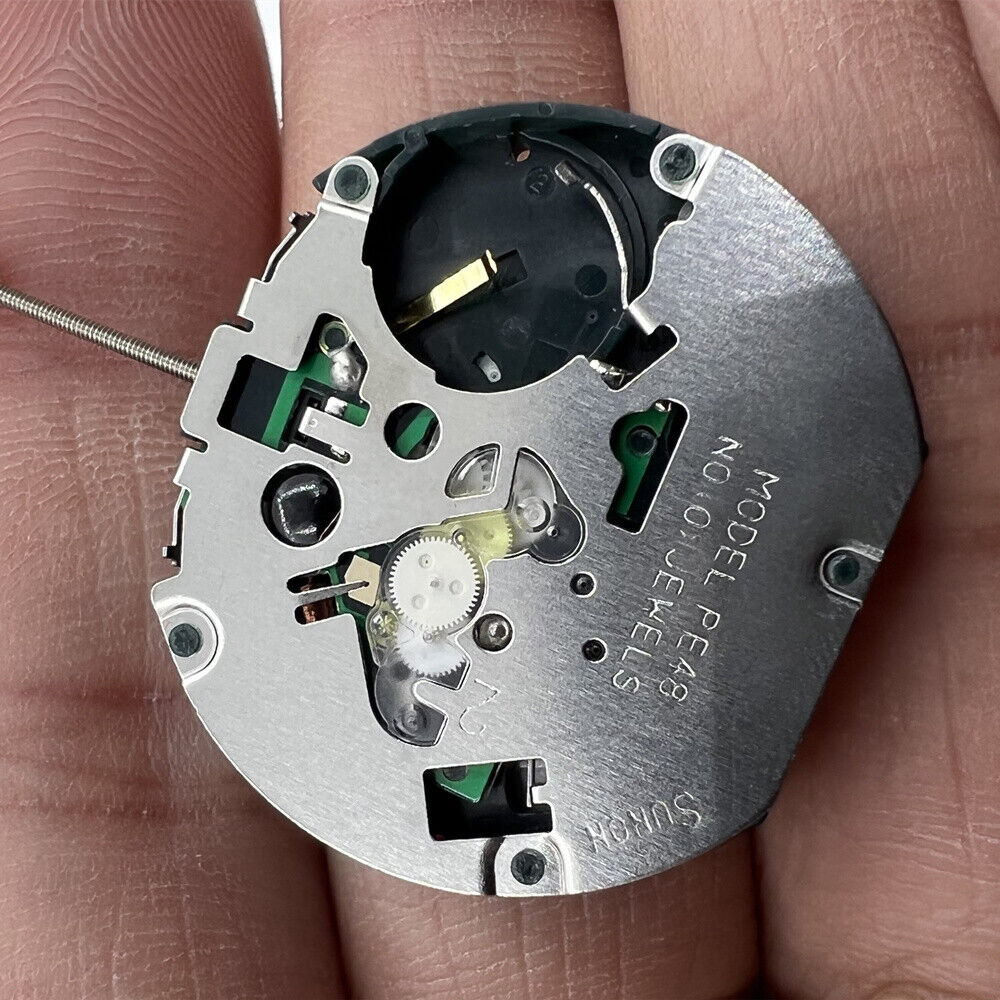 Sunon PE48 quartz watch movement with 2 hands and small seconds at 3 o'clock for precise timekeeping.