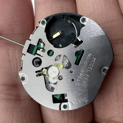 Sunon PE48 quartz watch movement with 2 hands and small seconds at 3 o'clock for precise timekeeping.