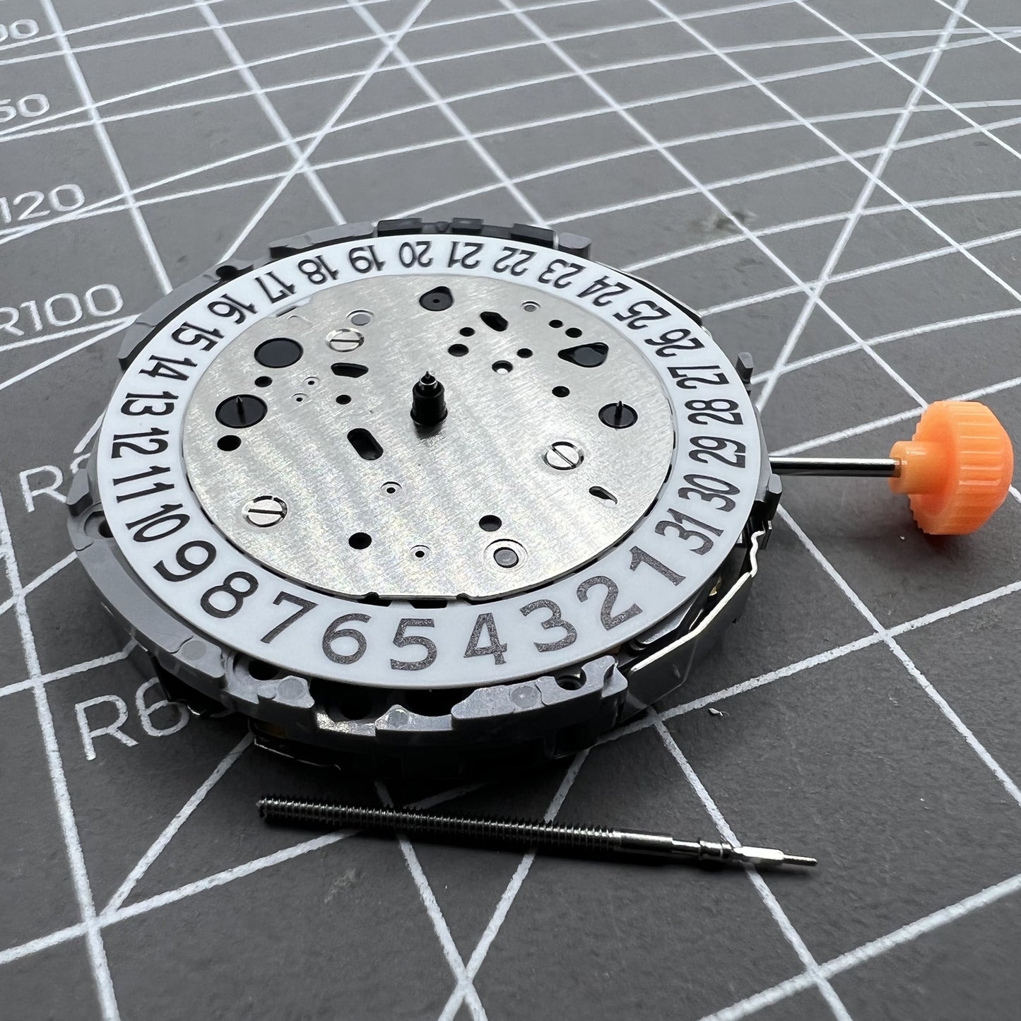 Miyota JP21 Quartz watch movement with date display at 3 o'clock for precision timekeeping.