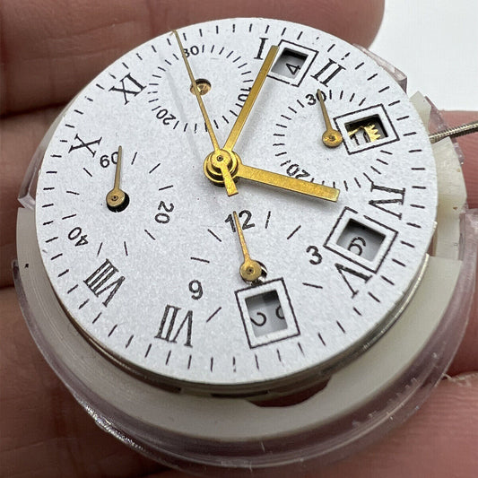 Asian 7750 automatic chronograph movement showing white calendar at 4:30 and seconds subdial at 9, precise timekeeping components.