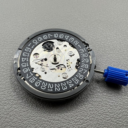 Japan NH35 automatic chronograph watch dial in black with date window and crown at 3 o?clock.