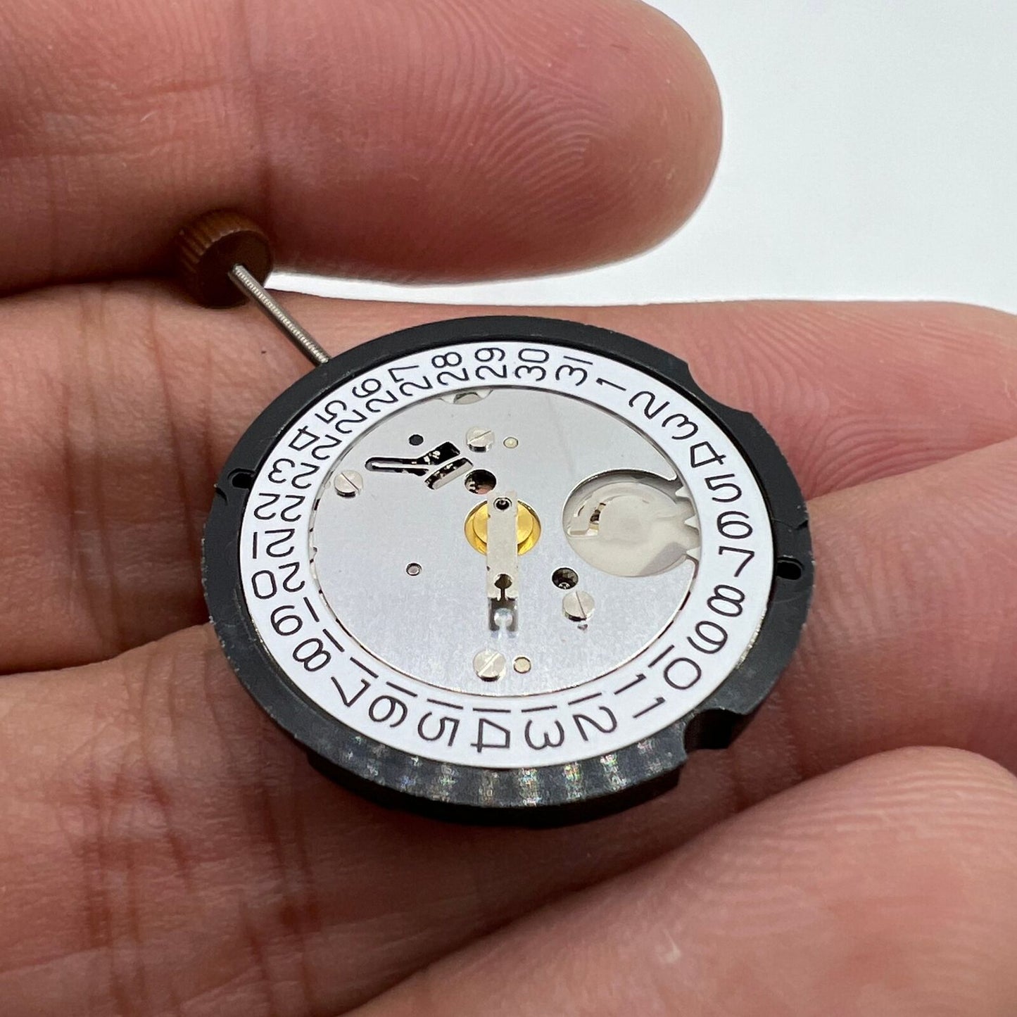 Ronda 505 quartz watch movement featuring date display at 3 o'clock, Swiss precision parts.