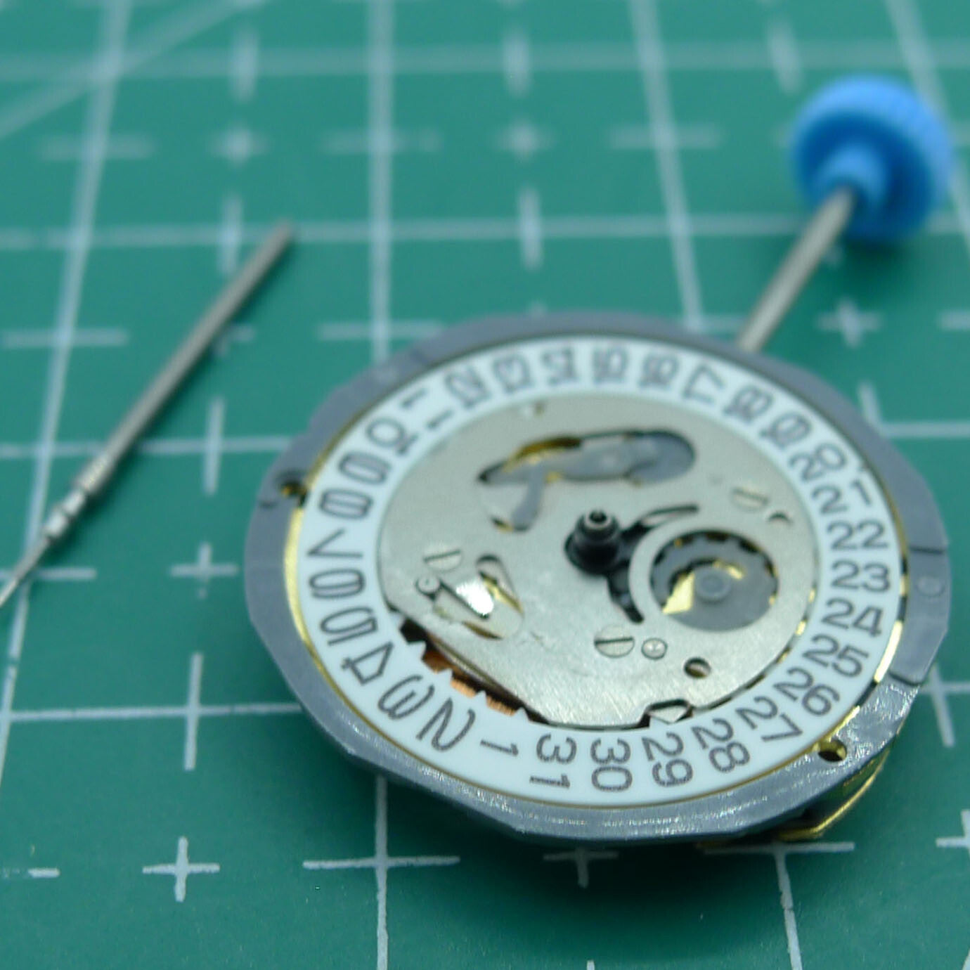 Miyota 6L12 quartz watch movement with date display at 3 o'clock, single calendar feature.