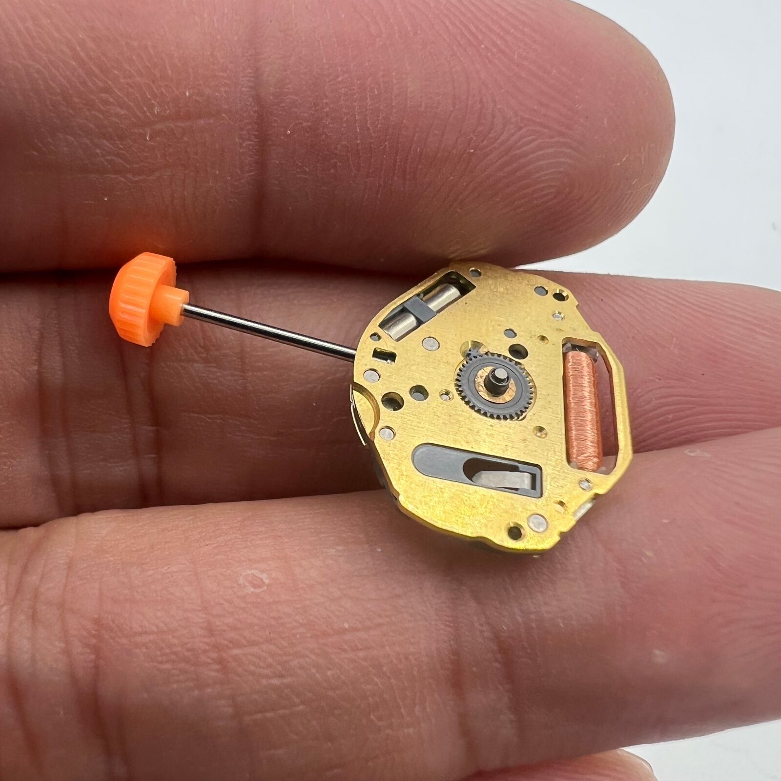 Miyota 1L22 Japan Quartz Movement with 2 hands, precise watch mechanism for quality timekeeping.