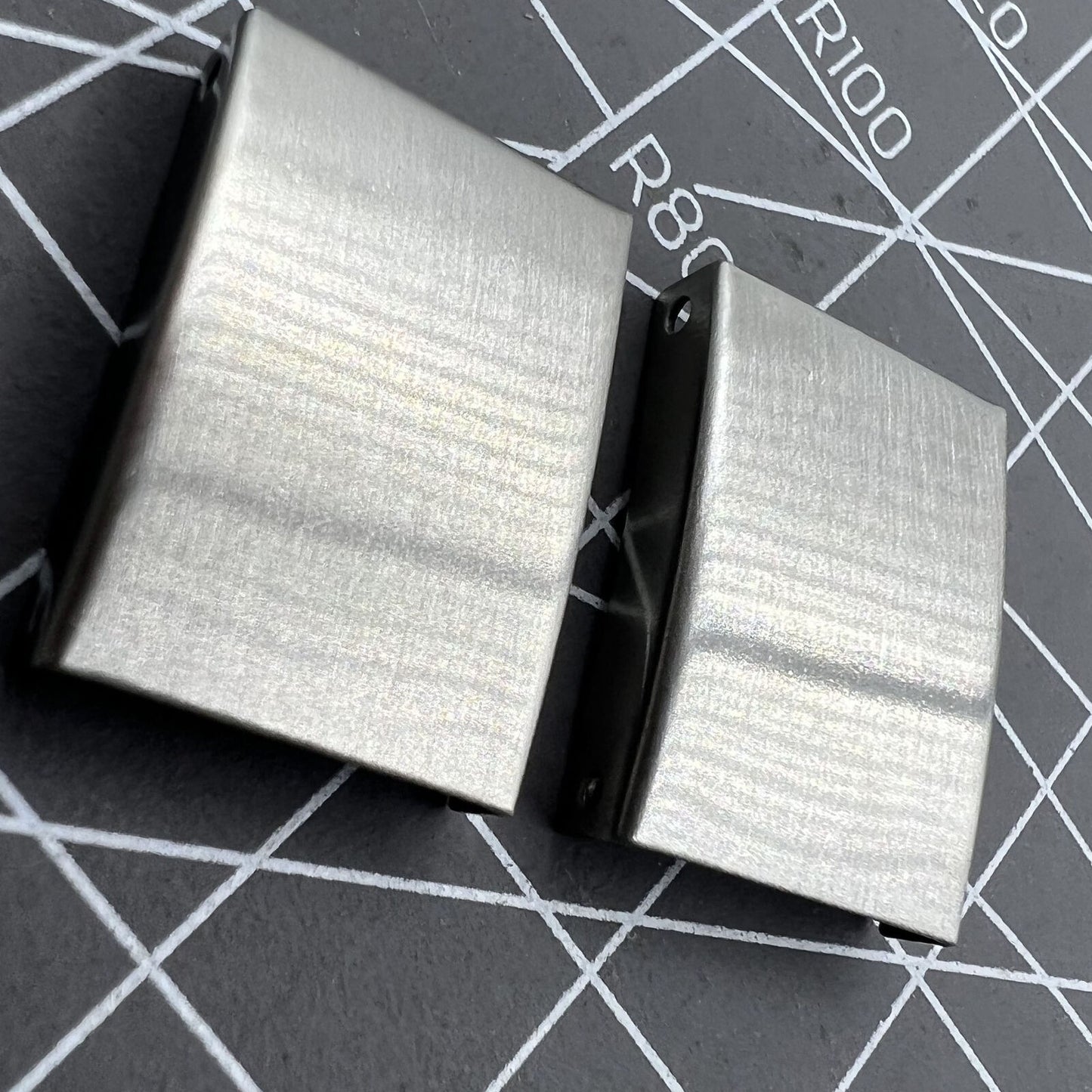 Silver 3-fold watch strap buckles extenders in 9 sizes, versatile accessories for watch customization.