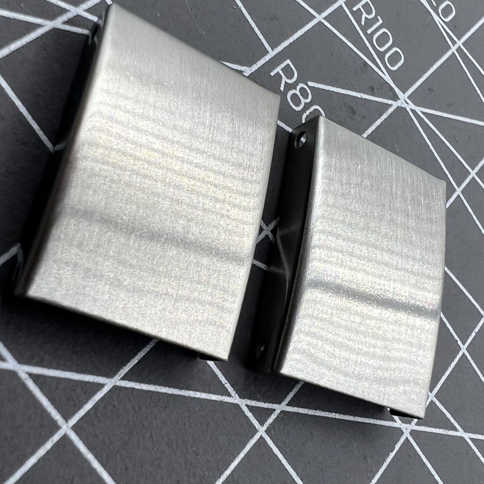 Silver 3-fold watch strap buckles extenders in 9 sizes, versatile accessories for watch customization.