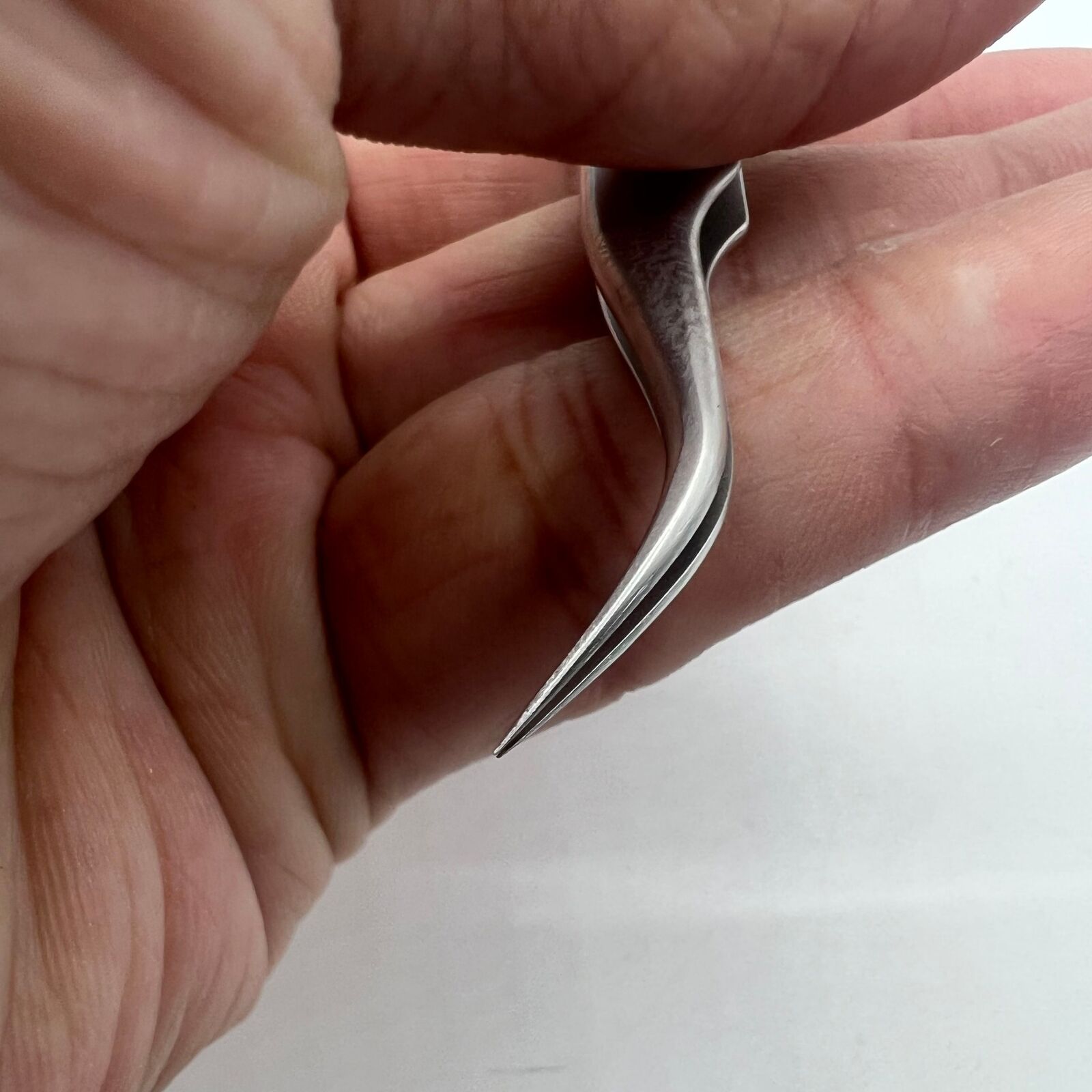 Swiss Bergeon 7026-7 antimagnetic curved tweezers, 110mm, perfect for precise watch repair tasks.