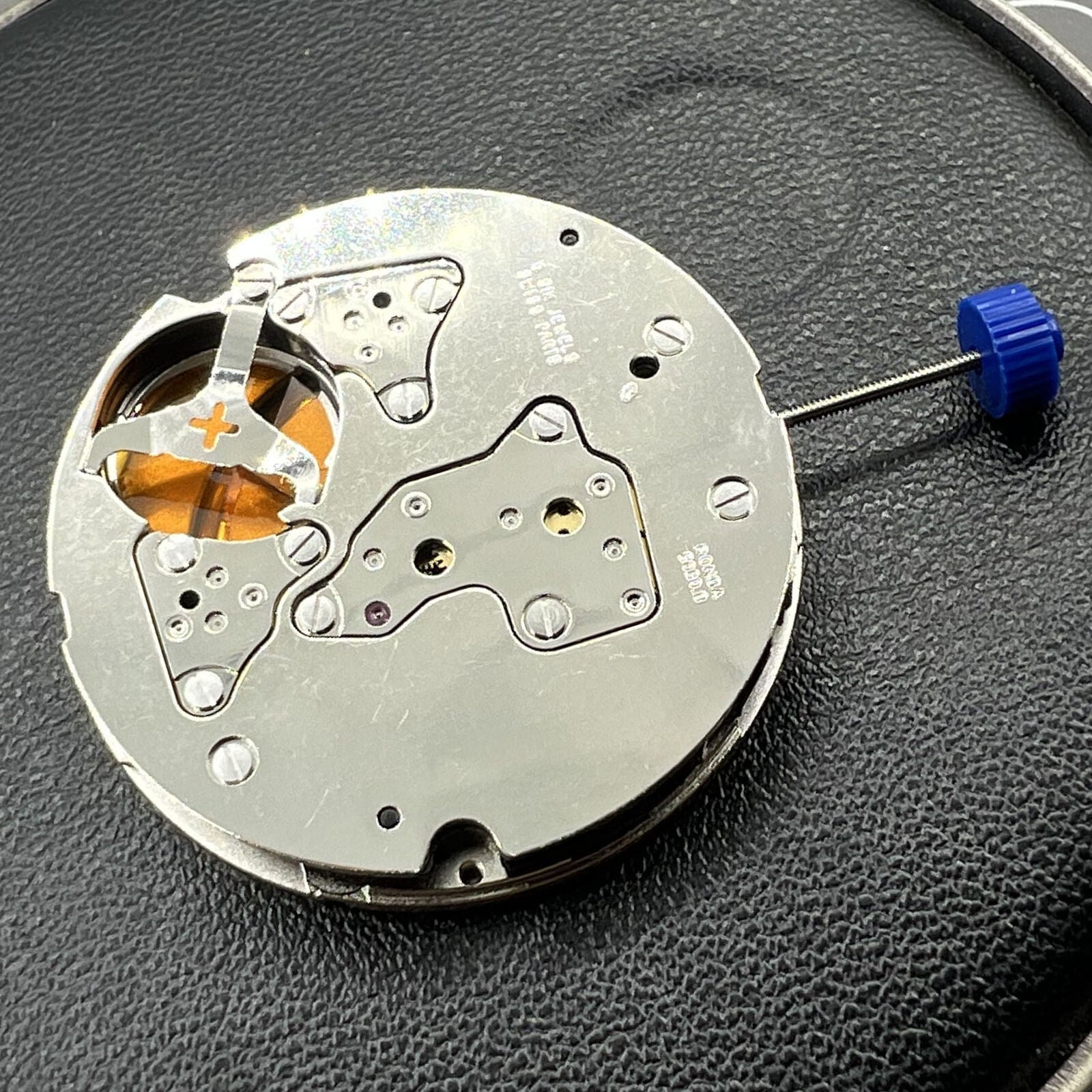 Swiss Ronda 5030D quartz watch movement with date at 4 o'clock, precise timing by Ronda brand.