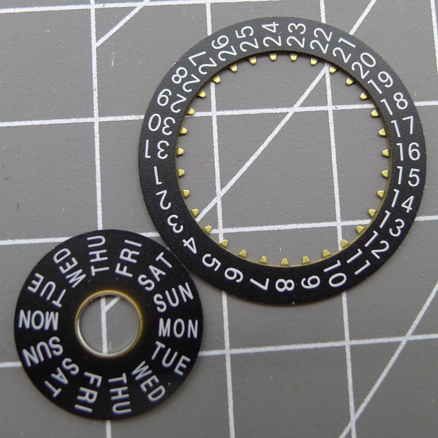 Pilot black date disk wheel and week wheel for China Made Dandong 7750 watch movement, perfect for repairs and customization.