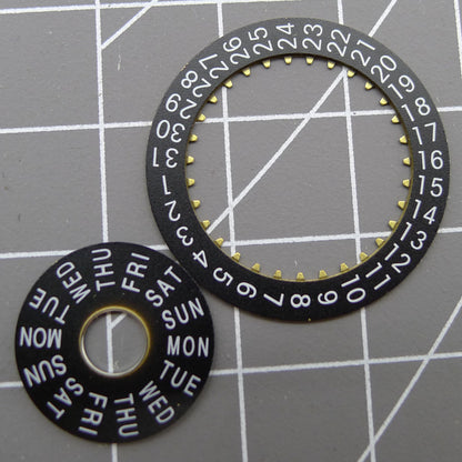 Pilot black date disk wheel and week wheel for China Made Dandong 7750 watch movement, perfect for repairs and customization.