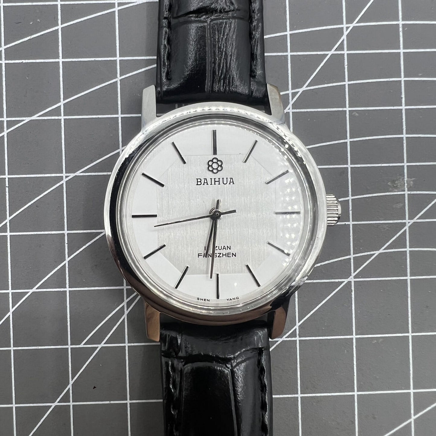 Baihua 37mm manual mechanical watch, silver dial, 19 jewels, shock-resistant for lasting durability.