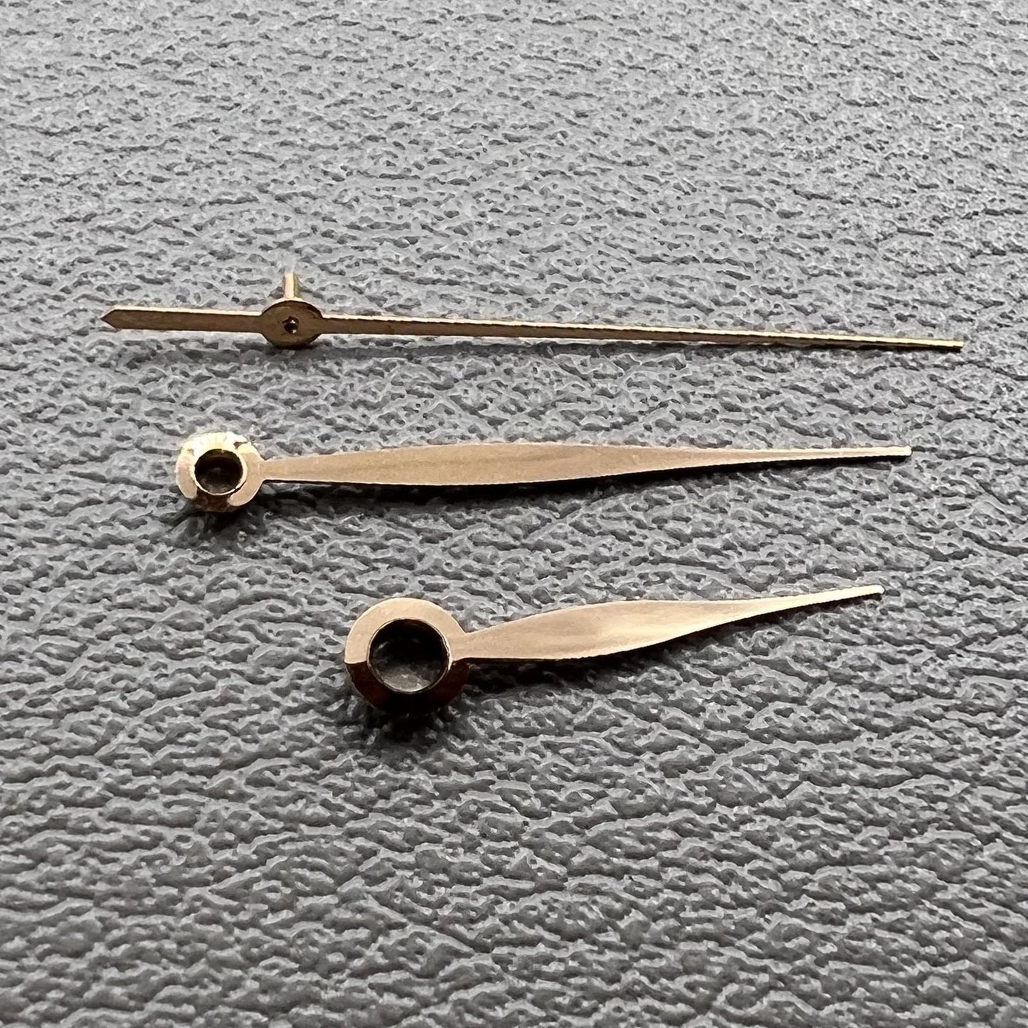 Polished rose gold leaf-shaped watch hands for LB06 movement, 2 sets per pack, elegant replacement parts.