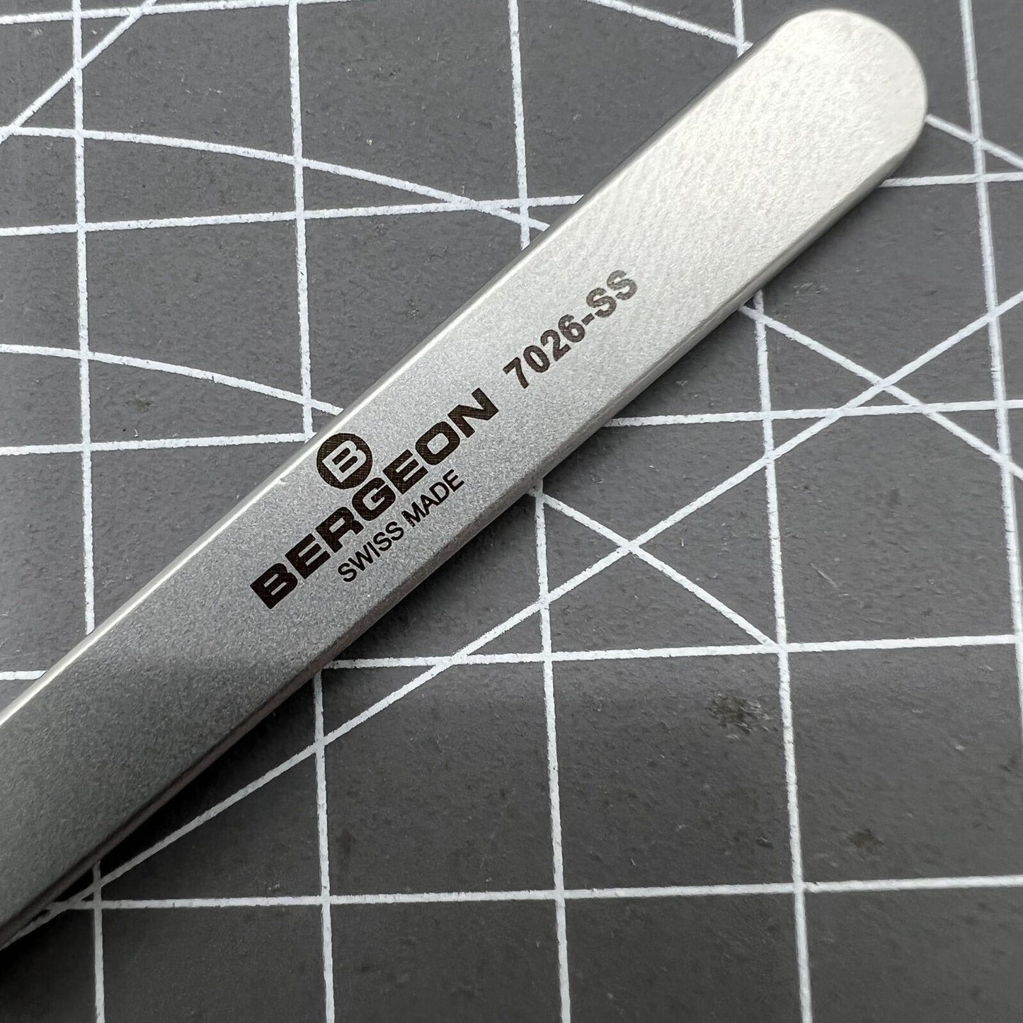 Swiss Bergeon 7026-SS antimagnetic tweezer with narrow, fine points for precise watch repair tasks.