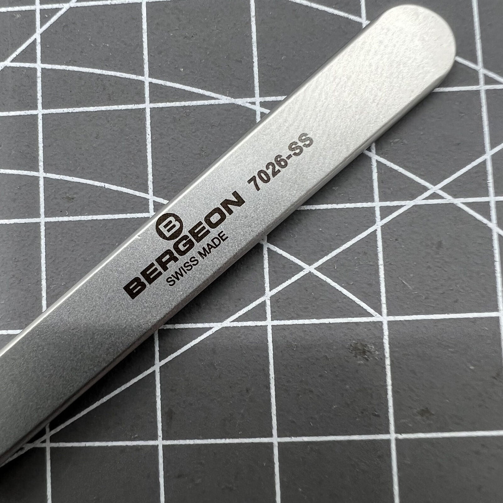 Swiss Bergeon 7026-SS antimagnetic tweezer with narrow, fine points for precise watch repair tasks.