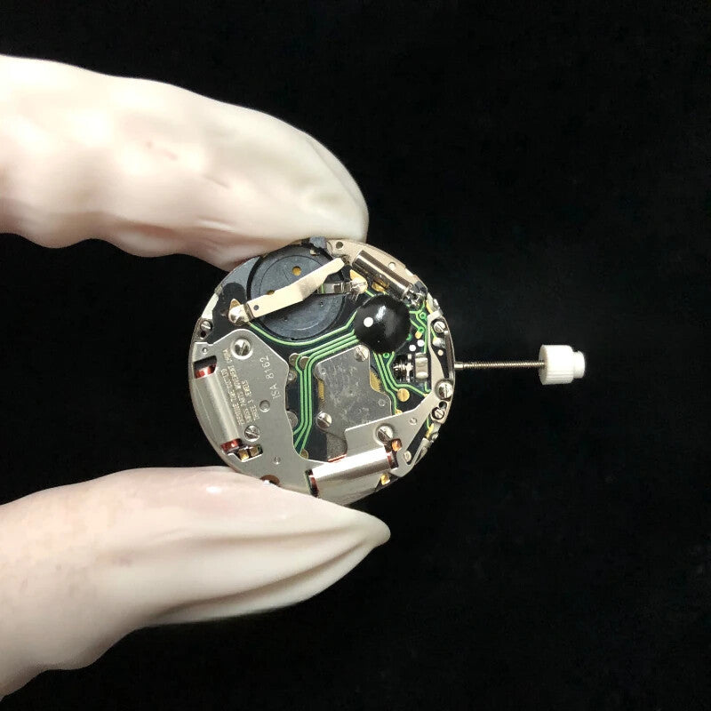 Swiss ISA 8162 quartz watch movement with date at 4/6, ideal for precise watch repairs and accessories.