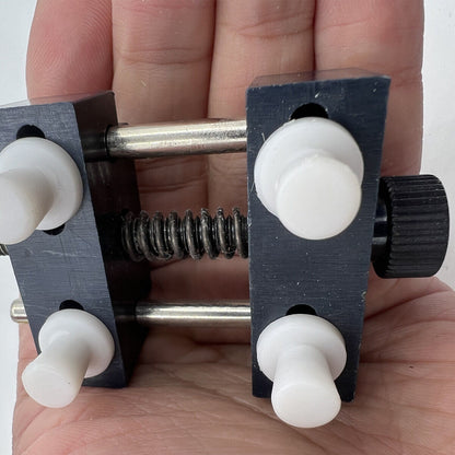 Adjustable watch back case opener, designed for precise removal and secure closing of watch covers.