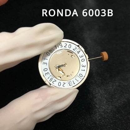 Ronda 6003B Swiss quartz watch movement with date at 12, ideal for precise watch repair parts.