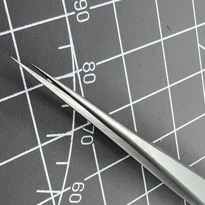 Bergeon 7027-SS Swiss Made tweezer with fine stainless steel tips for precise watch repair tasks.