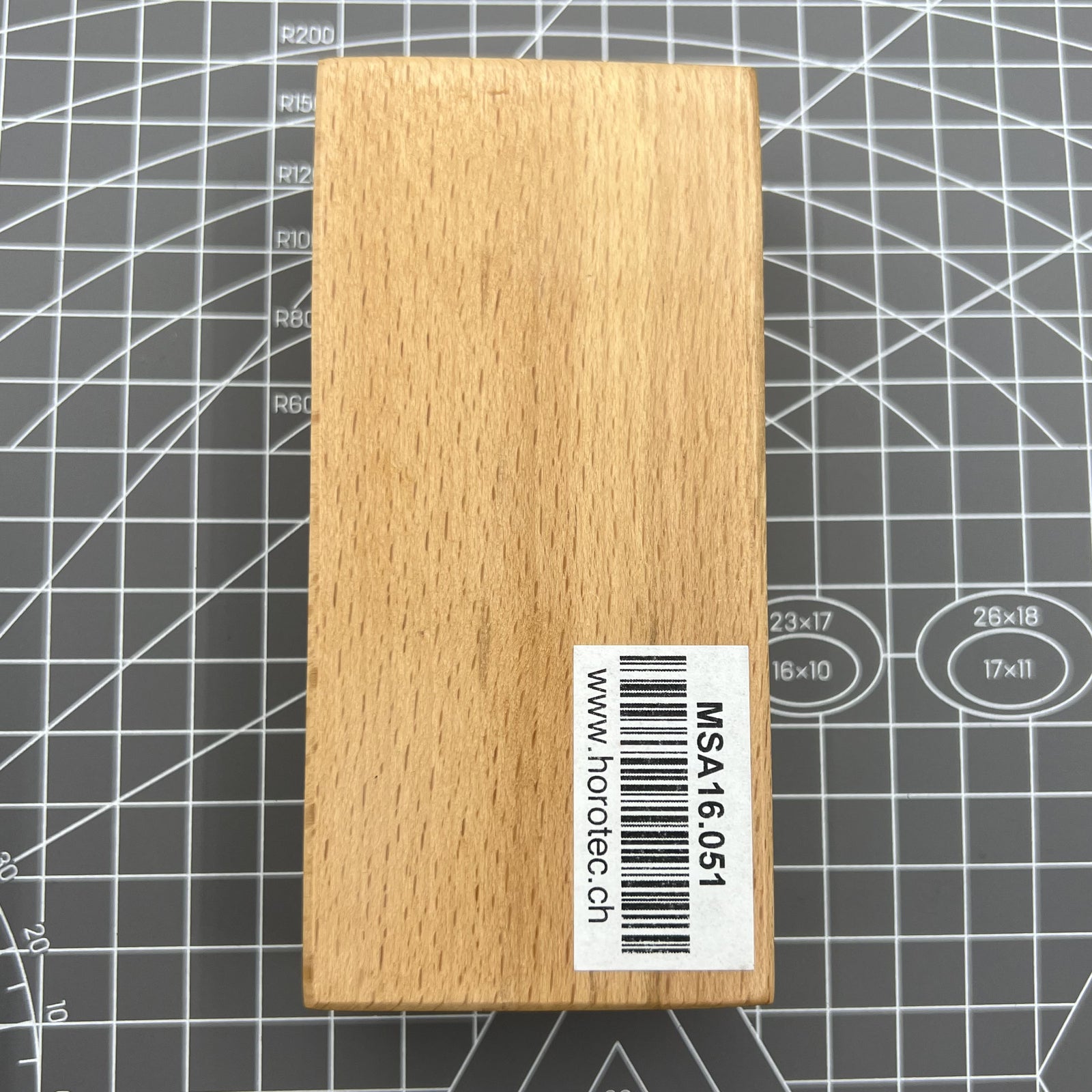 Swiss Tool Horotec MSA16.051 rectangular Arkansas stone in wooden box for watch accessory maintenance and polishing.