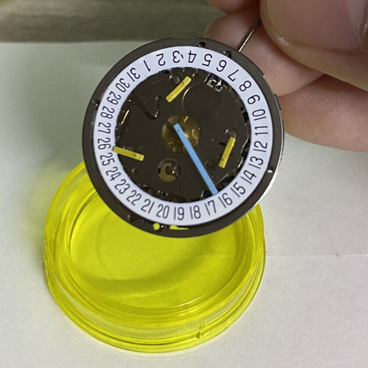 Silver ISA8171 watch accessories with ISA 8161 quartz movement, date at 6, white disk, and six hands.