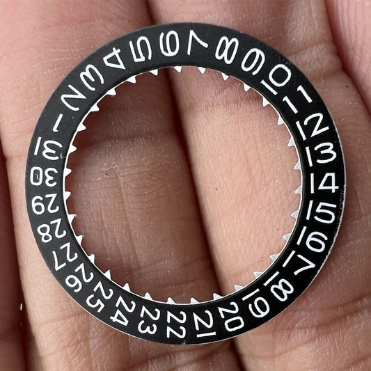 Japan Made black date disk wheel by Miyota, showing date at 3 o'clock for watch repair.