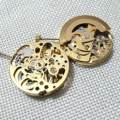 Golden 26.5mm DANDONG 7120 automatic watch movement with hollow design showcasing precise mechanical craftsmanship.