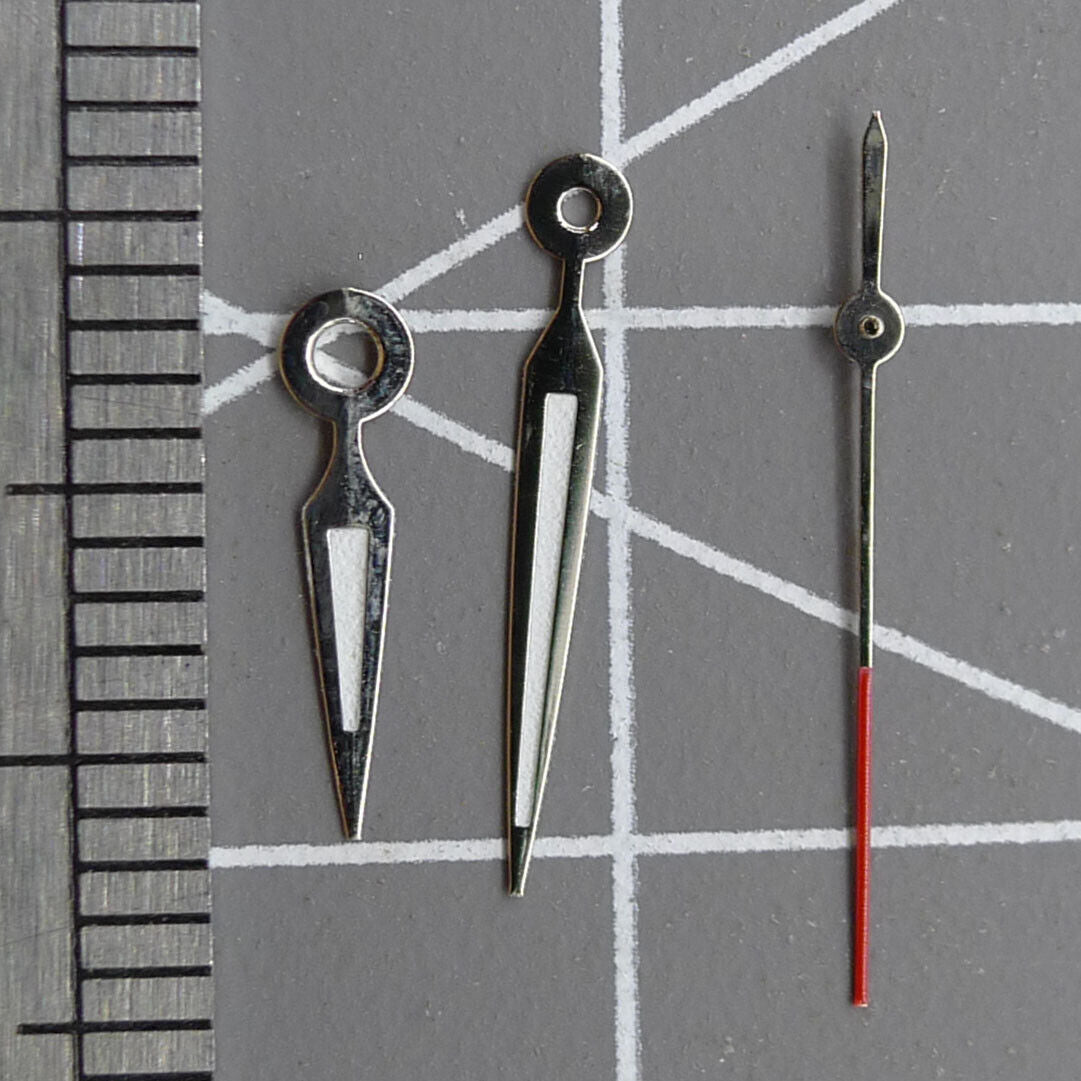 Luminous arrow-shaped watch hands, compatible with Miyota 2035 quartz movement for clear time reading.