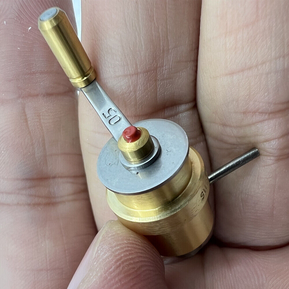 Bergeon 2729-ETA mainspring winder with spare barrels for precise ETA watch movement repairs and maintenance.