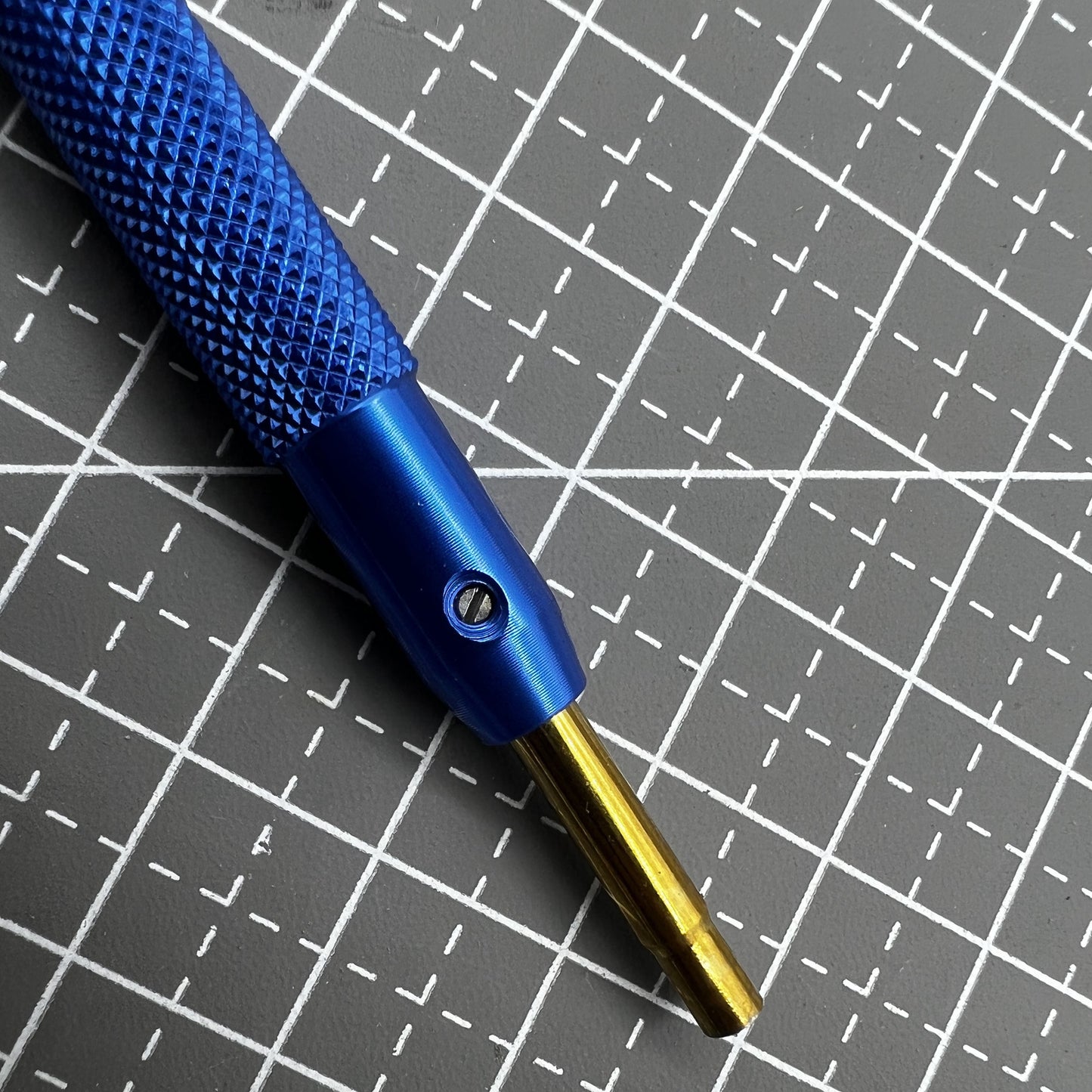 Stainless steel screwdriver with 2.3mm internal hex and opposite side, precision tool for watch accessories.