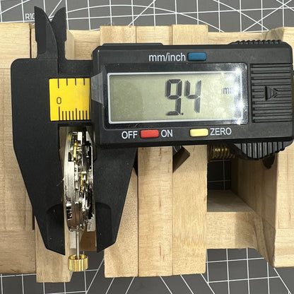 Dandong 7750 automatic watch movement with small seconds at 6 o'clock, ultra-thin design, precision timekeeping.