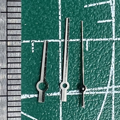 Long silver watch hands with black trim, no lume, precision fit for NH35/NH36/4R/7S movements.