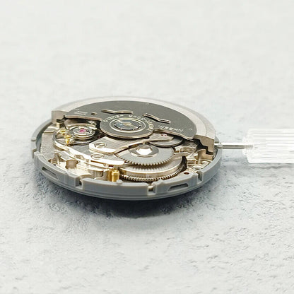 Seiko NH36 automatic watch movement with black Arabic date dial and crown at 3.8 for precise timekeeping