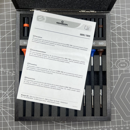 Bergeon 7899-A10 ergonomic watch screwdrivers set �0.50-3.00mm in wooden box for precise watch repair.