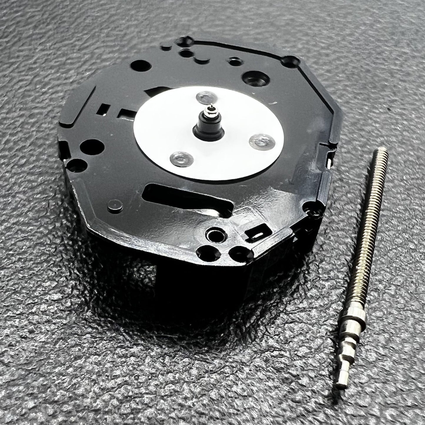 Hattori Epson PC21 quartz watch movement for precise timekeeping in wristwatches.