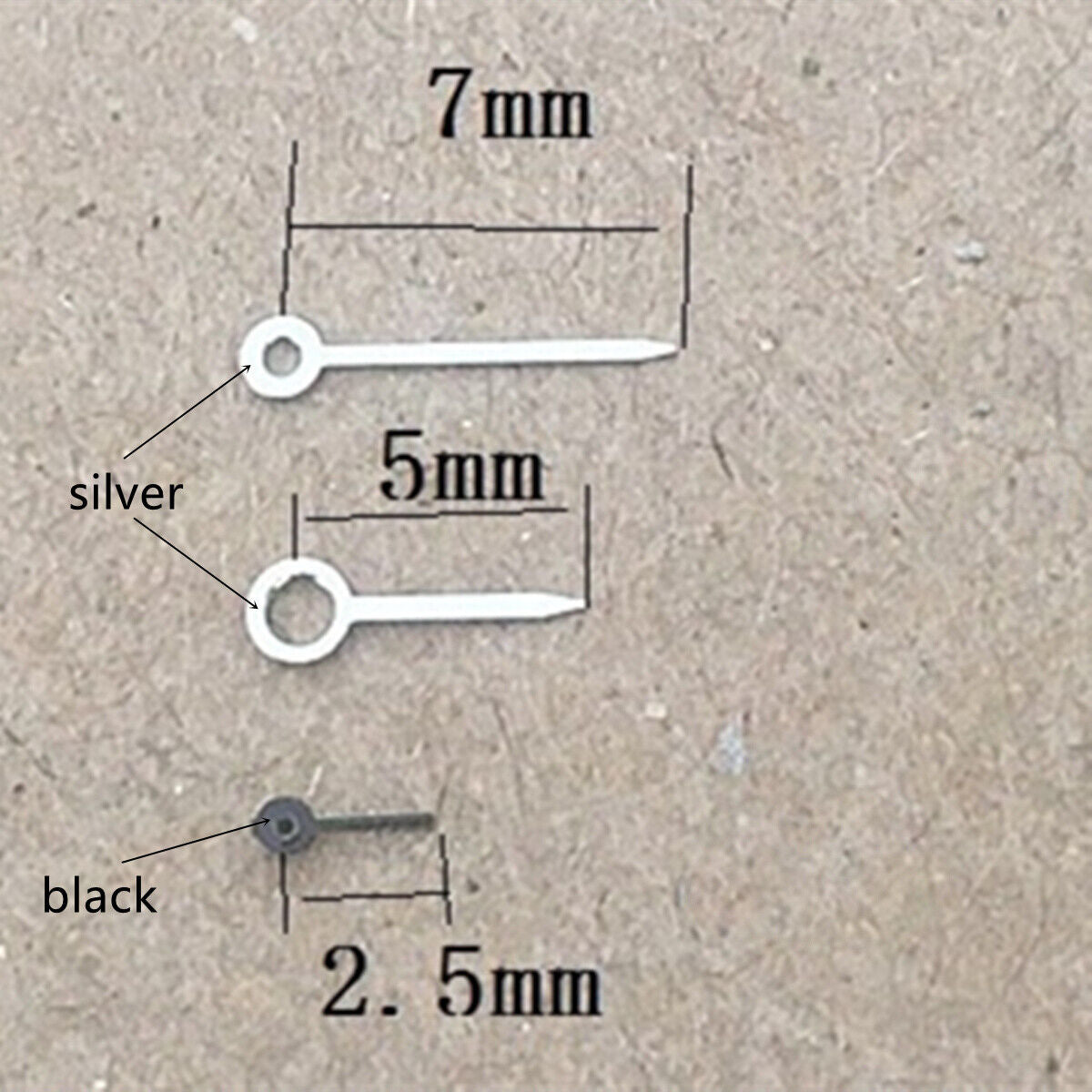 Silver and black arrow-shaped watch hands for Miyota 1L45 quartz movement, precision timekeeping accessories.