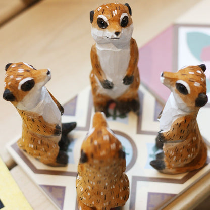 Handmade Meerkat wooden figurine, detailed sculpture ideal for watch accessory display and d�cor.
