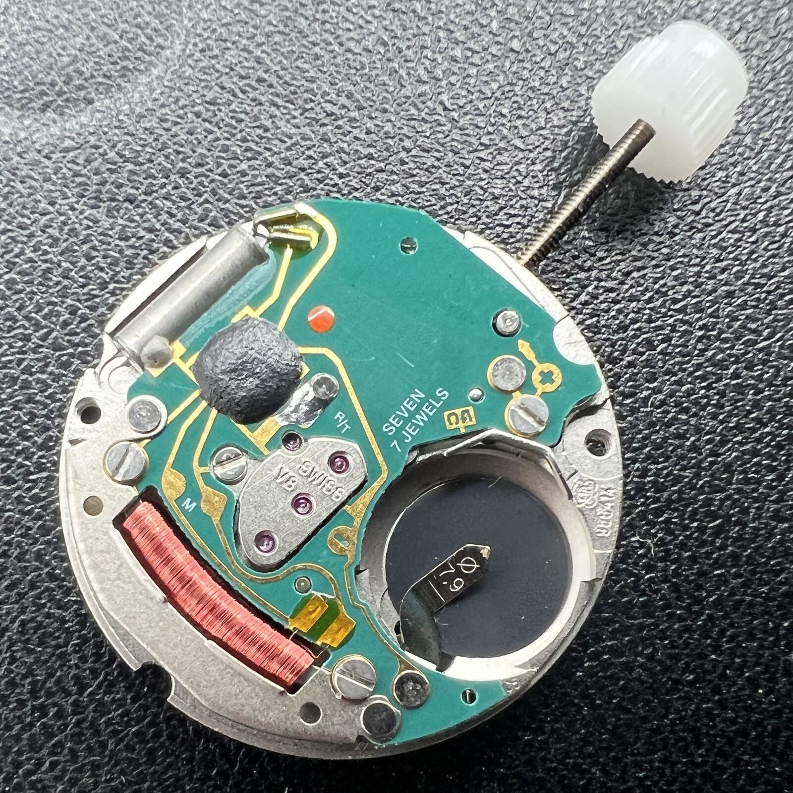 ETA956.414 Date at 3 quartz watch movement by ETA, reliable and precise timekeeping component for watch repairs.
