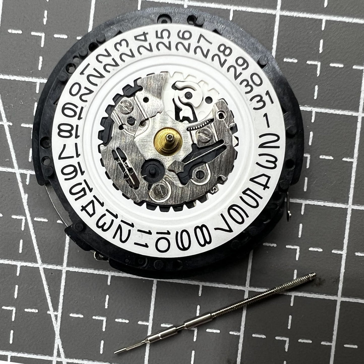 Seiko 5M62A quartz watch movement with date at 3 o'clock, reliable Japanese craftsmanship.