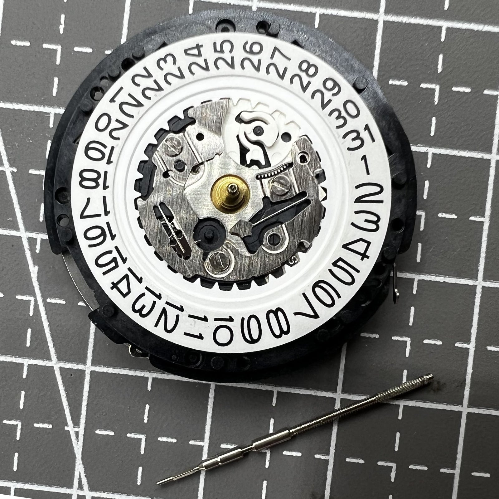 Seiko 5M62A quartz watch movement with date at 3 o'clock, reliable Japanese craftsmanship.