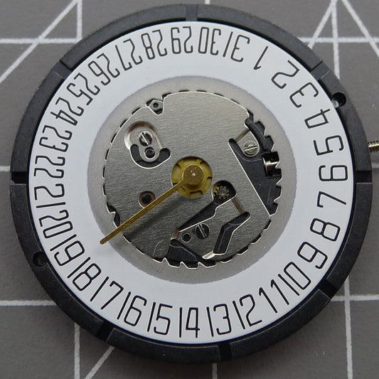 Swiss ISA 2331 watch part with black dial, quartz movement, and date display at 6 o'clock for precise timekeeping.