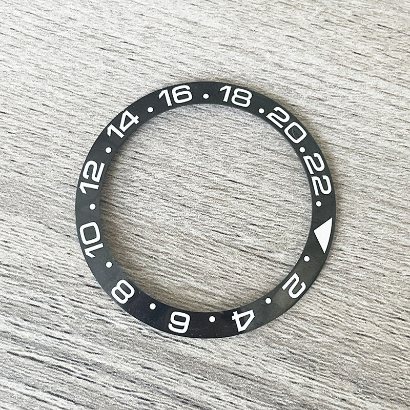 38mm ceramic bezel insert in black with super luminous markers for automatic GMT men's watches.